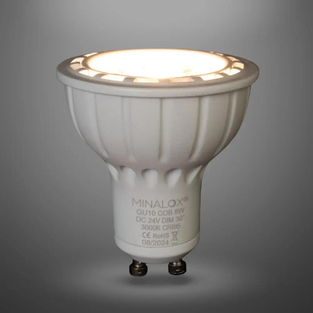 MINALOX_stmievatelna_LED_ziarovka_GU10_8W_3000K_36D_biela_DC24V_smarthome_rozsvietena.webp